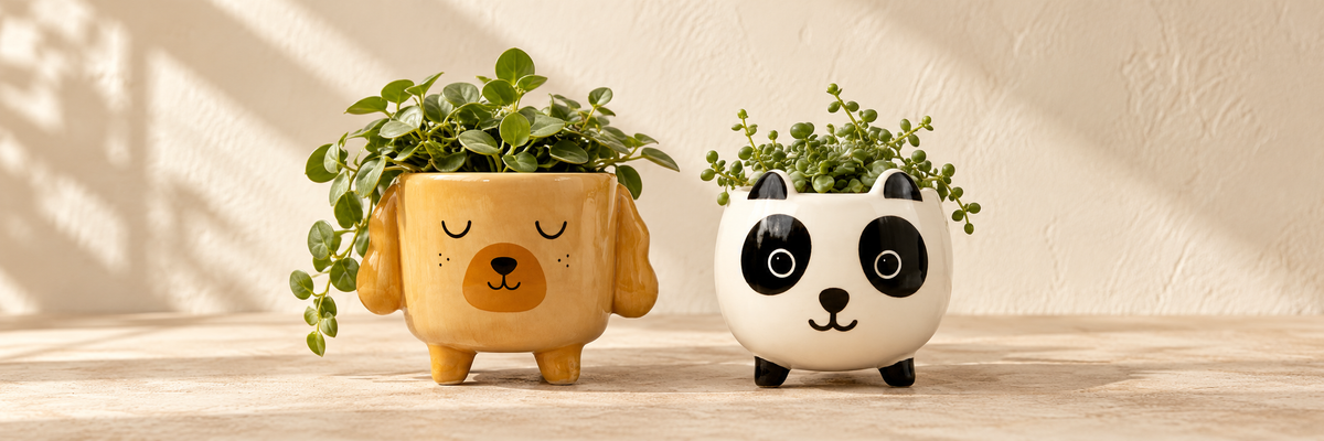 Mini Cockapoo Planter on Legs and Mini Panda Planter Three Legged Kawaii Design arranged in a warm, softly lit setting.