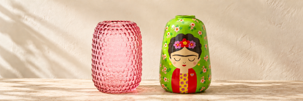 Glass Bobble Vase - Pink and Floral Frida Large Vase arranged in a warm, softly lit setting.