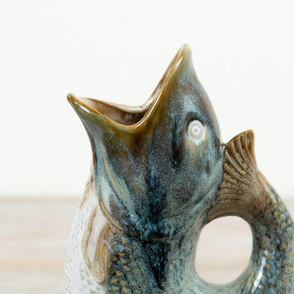 Close-up of the Portland Living fish vase showing the textured scales and curved tail handle