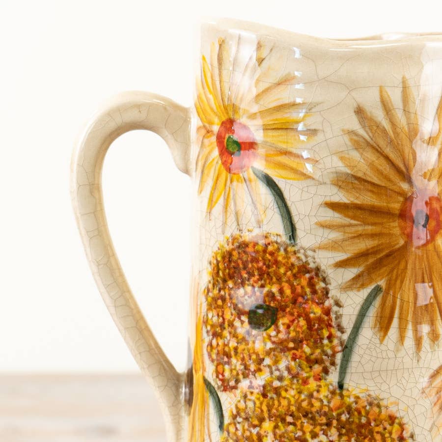 Close-up of the Sunflower Jug Vase showing the handle and floral texture