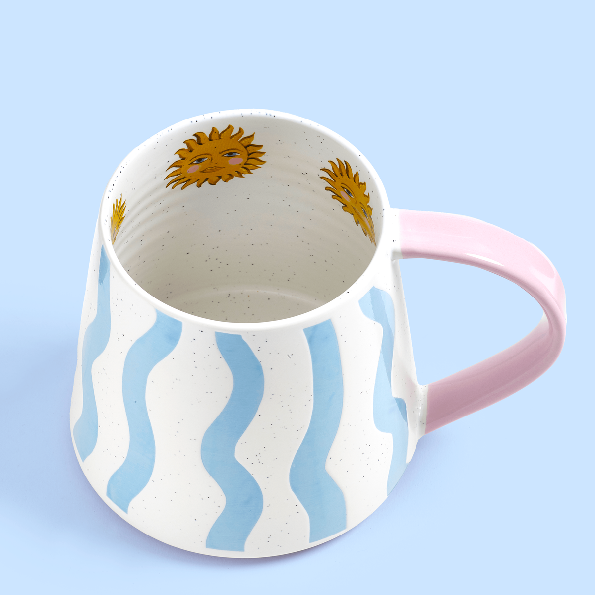 Top view of Eleanor Bowmer Blue Wave Mug showing illustrated suns inside the rim