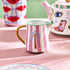 Eleanor Bowmer Palm Milk Jug with pink stripes styled on a pink tablecloth